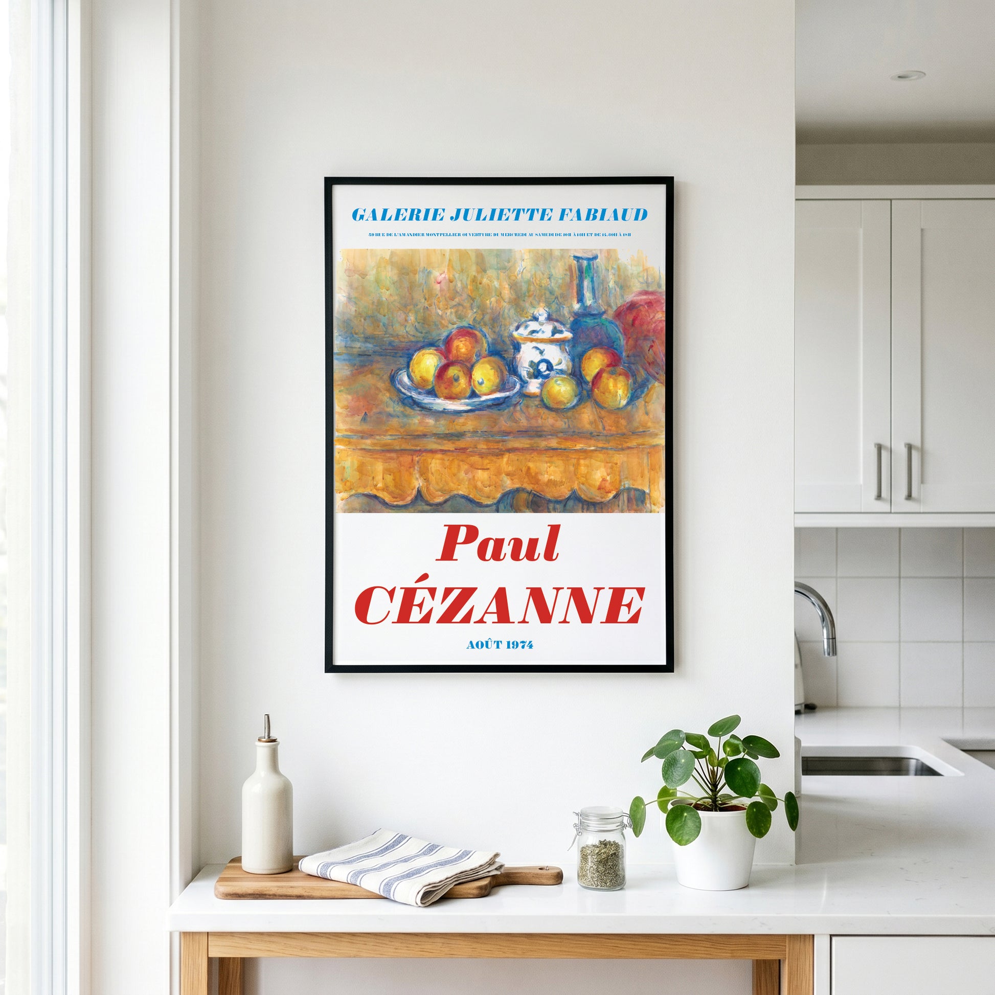Framed artwork of Paul Cézanne's painting in a kitchen setting