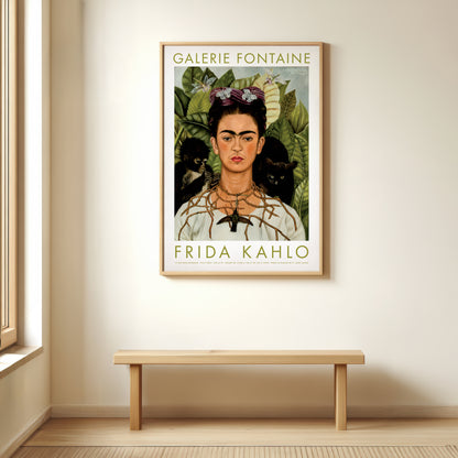 Frida Kahlo artwork in a frame on a wall with a bench below