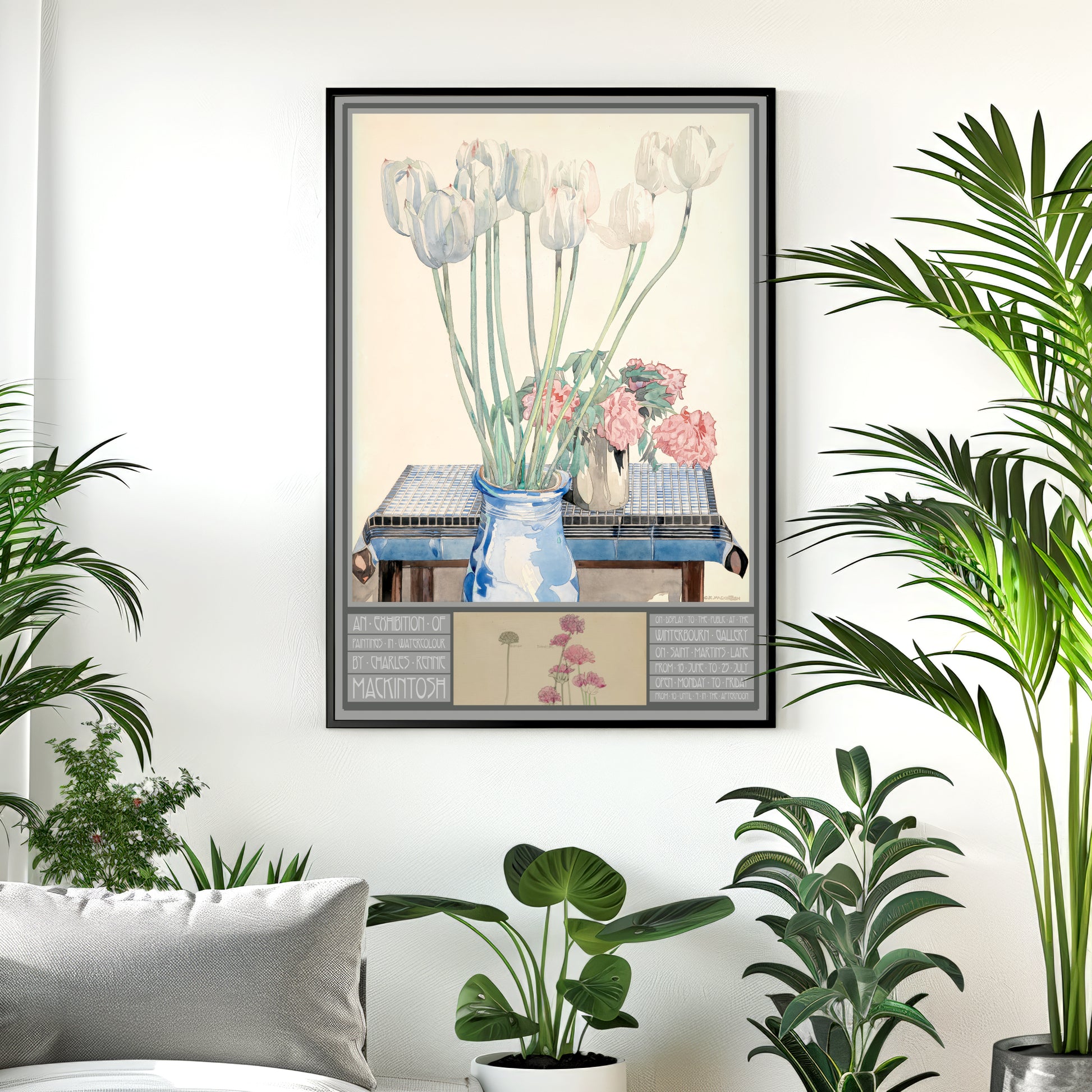 Framed artwork of flowers on a wall with plants around